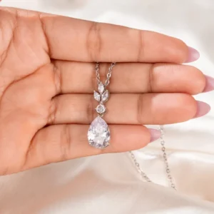 Silver marquise cut bridesmaid necklace with pear shape and round-cut center, perfect bridal jewelry