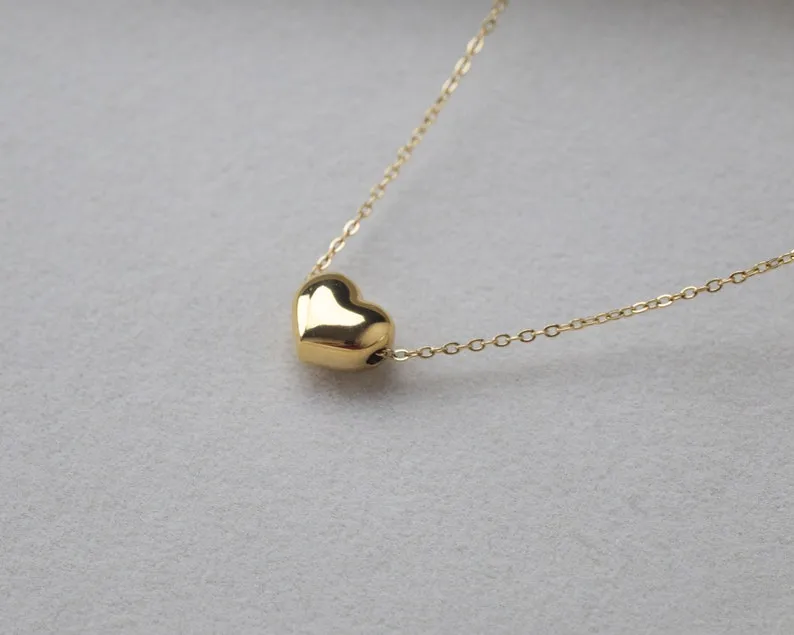 Minimalistic Gold Heart Necklace for Women - Dainty pendant perfect for everyday wear and gifting.