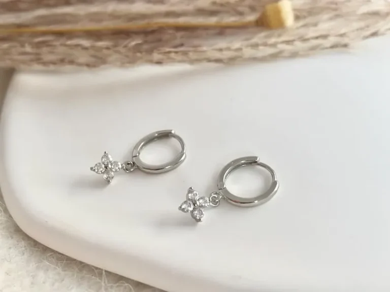 Delicate Silver Huggie Hoops featuring an everyday sterling silver earring stack set designed for multiple piercings – the perfect gift idea for her