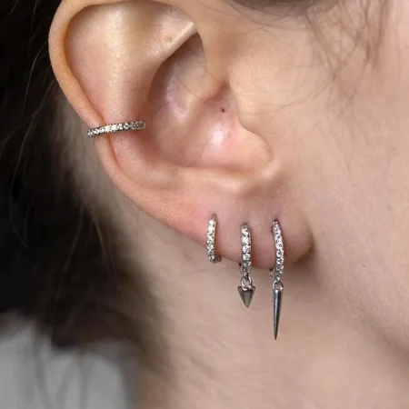 Silver Four Earring Set featuring a silver earring stack designed for multiple piercings with stylish huggie hoops – the perfect gift idea for her