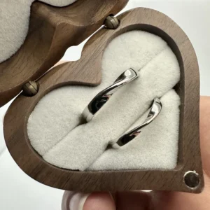 Adjustable couple rings set in 925 sterling silver with twisted design, custom engraving, promise jewelry, sustainable, and perfect for couples.