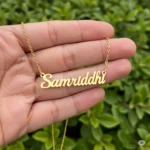 oxidized silver name necklace on woman's necklace